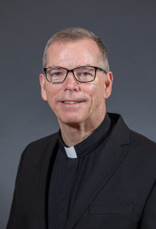 REV. THOMAS P. LOONEY, CSC, PHD