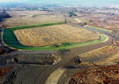 Aerial view of reclaimed, rectangular piece of land covered in straw matting